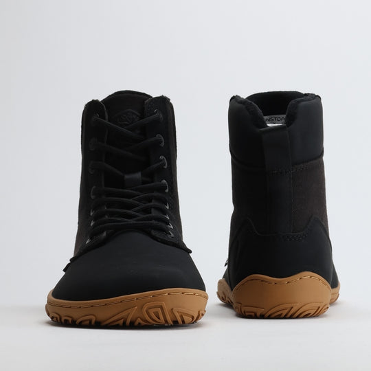 Pair of black barefoot winter boots shown from the front and back on a light gray background.