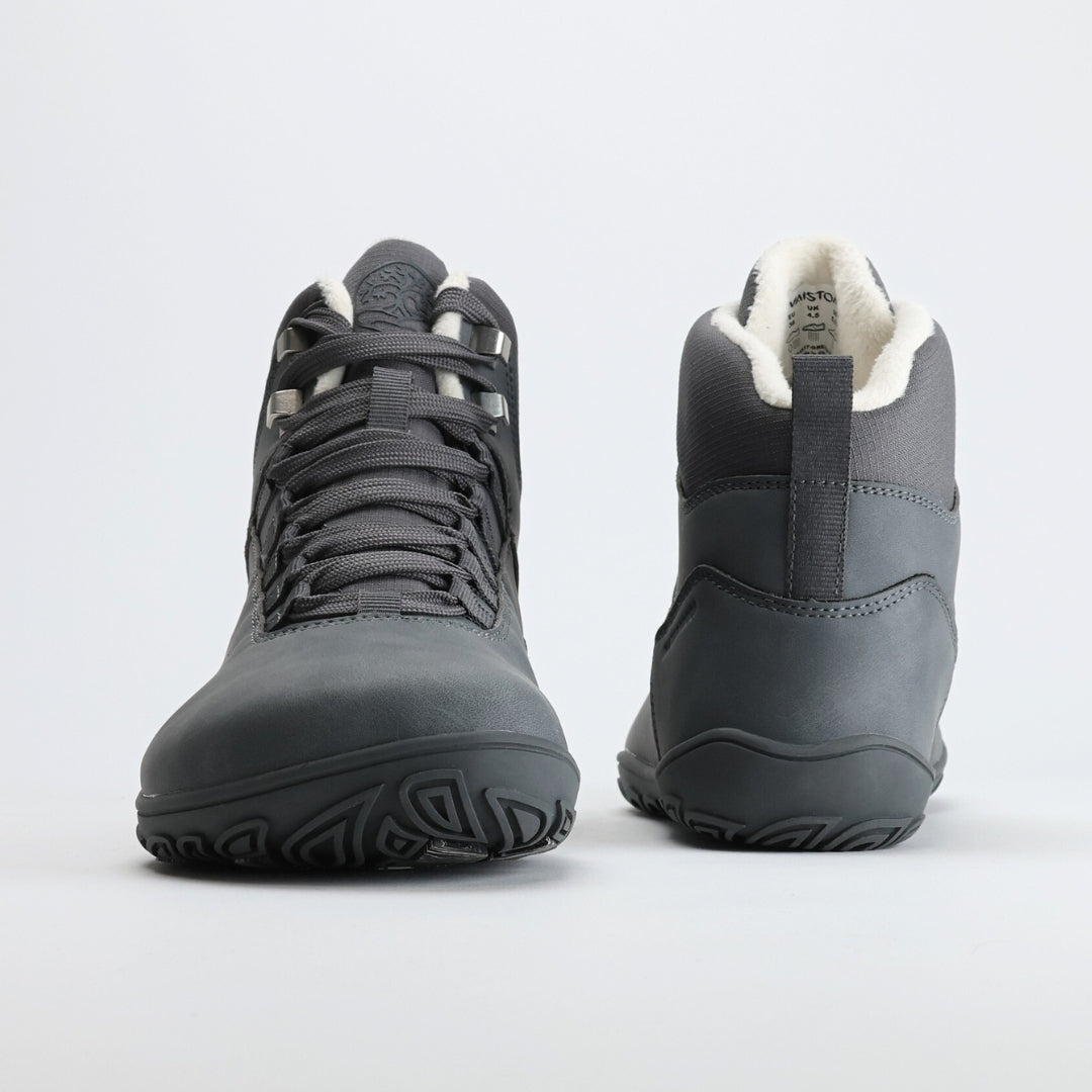 Pair of frost gray barefoot hiking boots shown from the front and back on a light gray background.