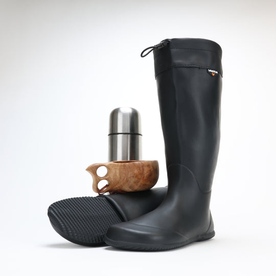 vaistoa katve barefoot shoes rubber rain boots black front angle one boot rolled kuksa thermos silver