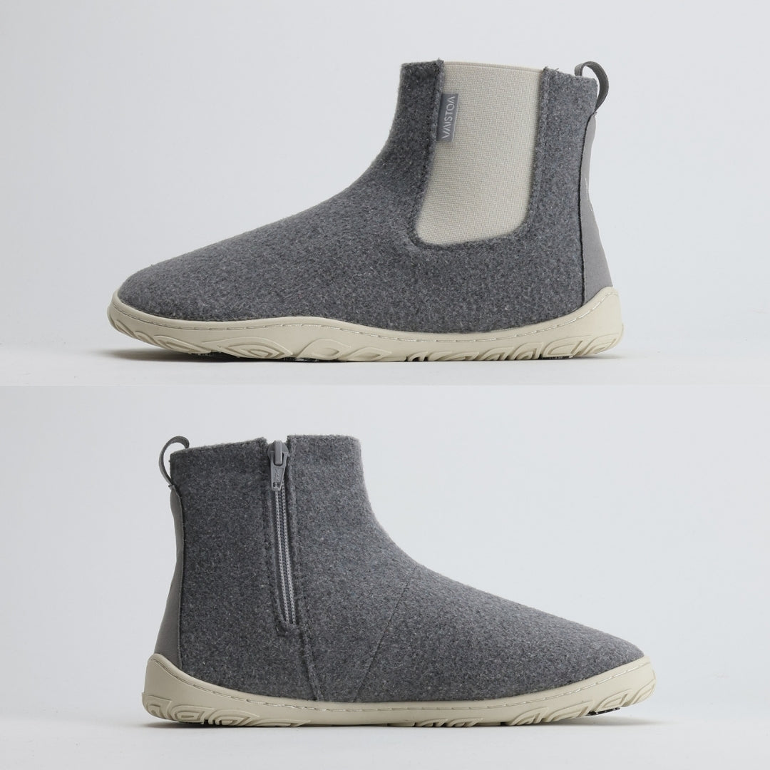 Pearl grey barefoot winter felt Chelsea boots shown from medial and lateral angles, highlighting the flat zero-drop sole that promotes natural posture, alignment, and balance.