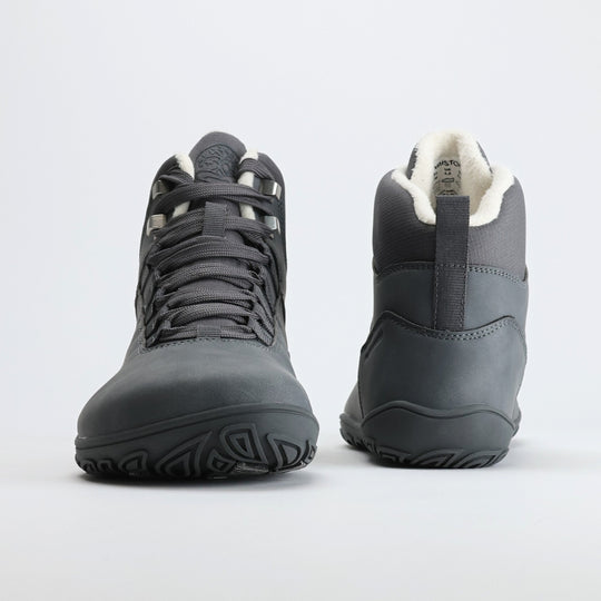 Pair of frost gray barefoot hiking boots shown from the front and back on a light gray background.
