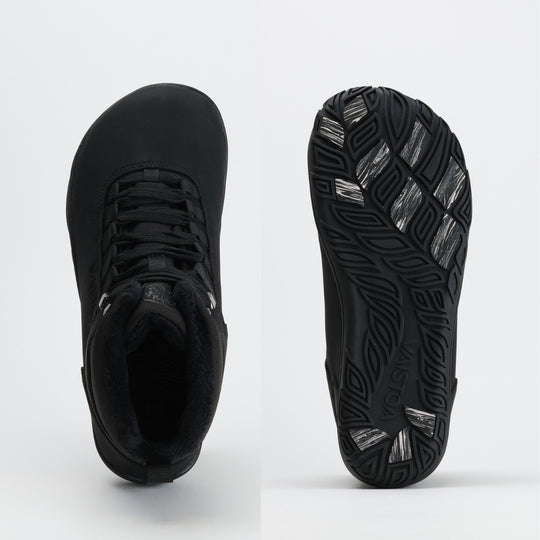 Black barefoot hiking boot showing a wide anatomical toe box on a light gray background.
