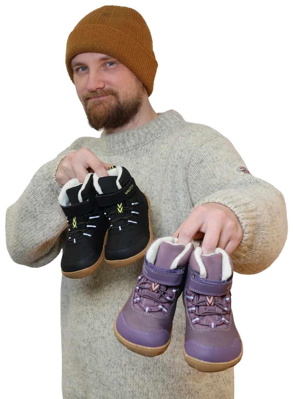 Physiotherapist Matti Melanen holding Vaistoa Ulappa 2 Kids waterproof barefoot sneakers