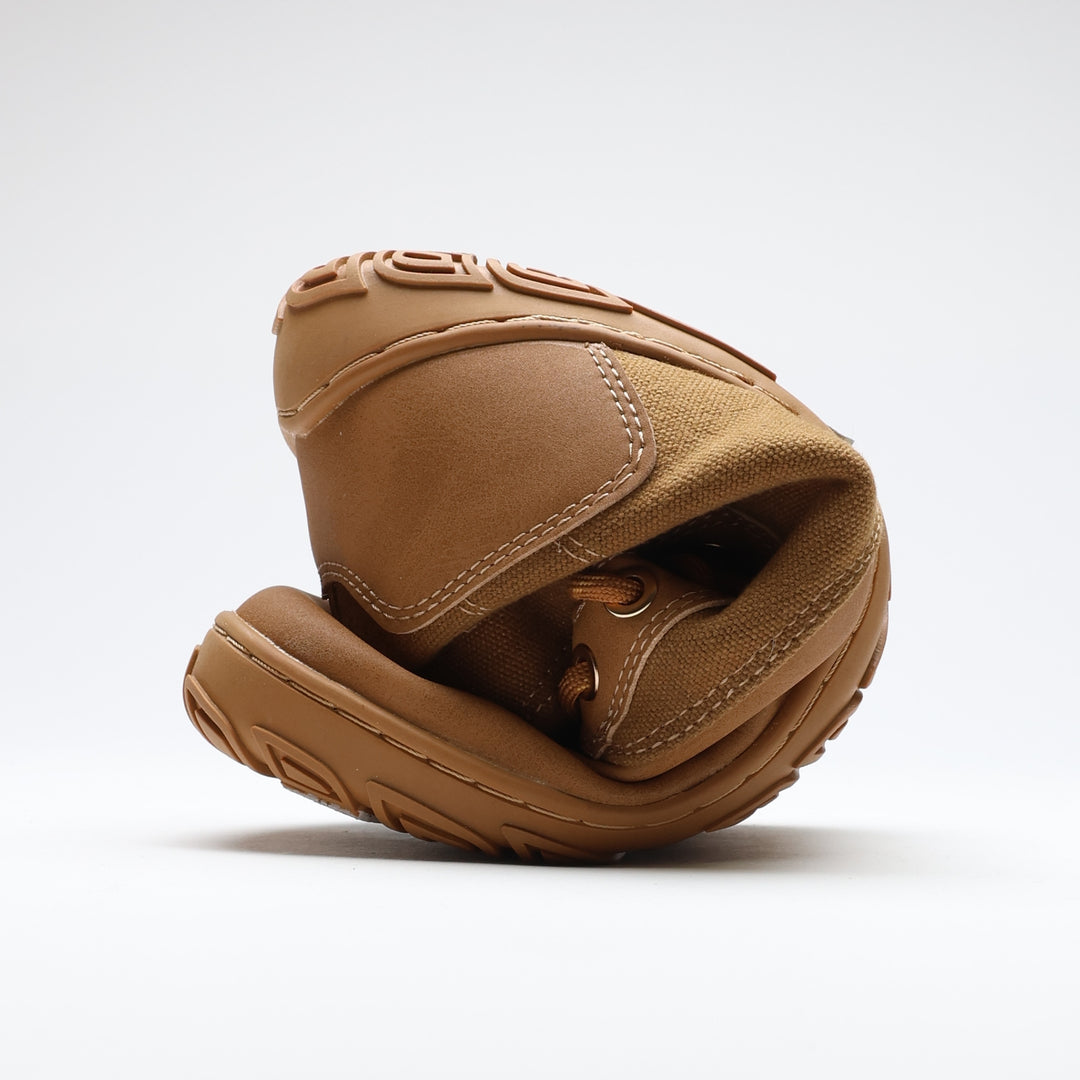 Vaistoa Hurmos 3 casual winter barefoot boots – shoe rolled up, showing how the thin, flexible outsole bends