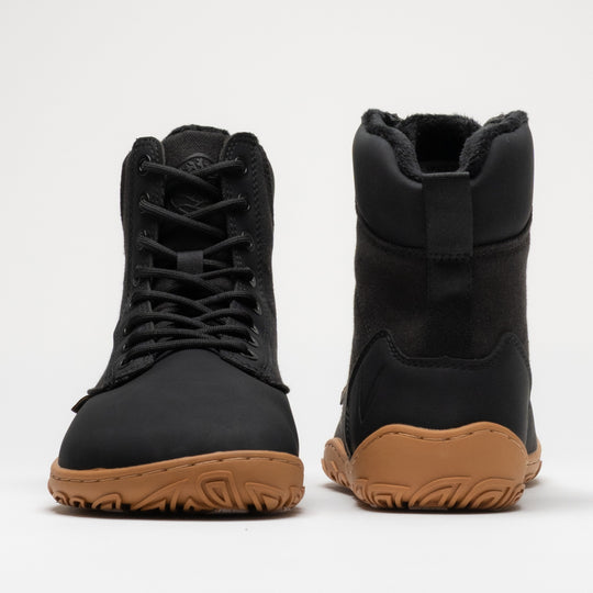 Vaistoa Hurmos 3 casual winter barefoot boots – pair shown from the front and back, the left shoe showing the lacing and toe box and the right shoe the heel, pull tab and faux fur lining