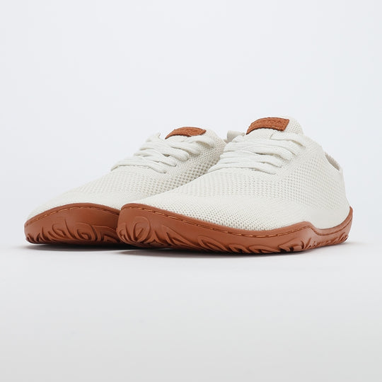 vaistoa iloa barefoot shoes knitted sneakers natural white with terracotta sole front angle pair