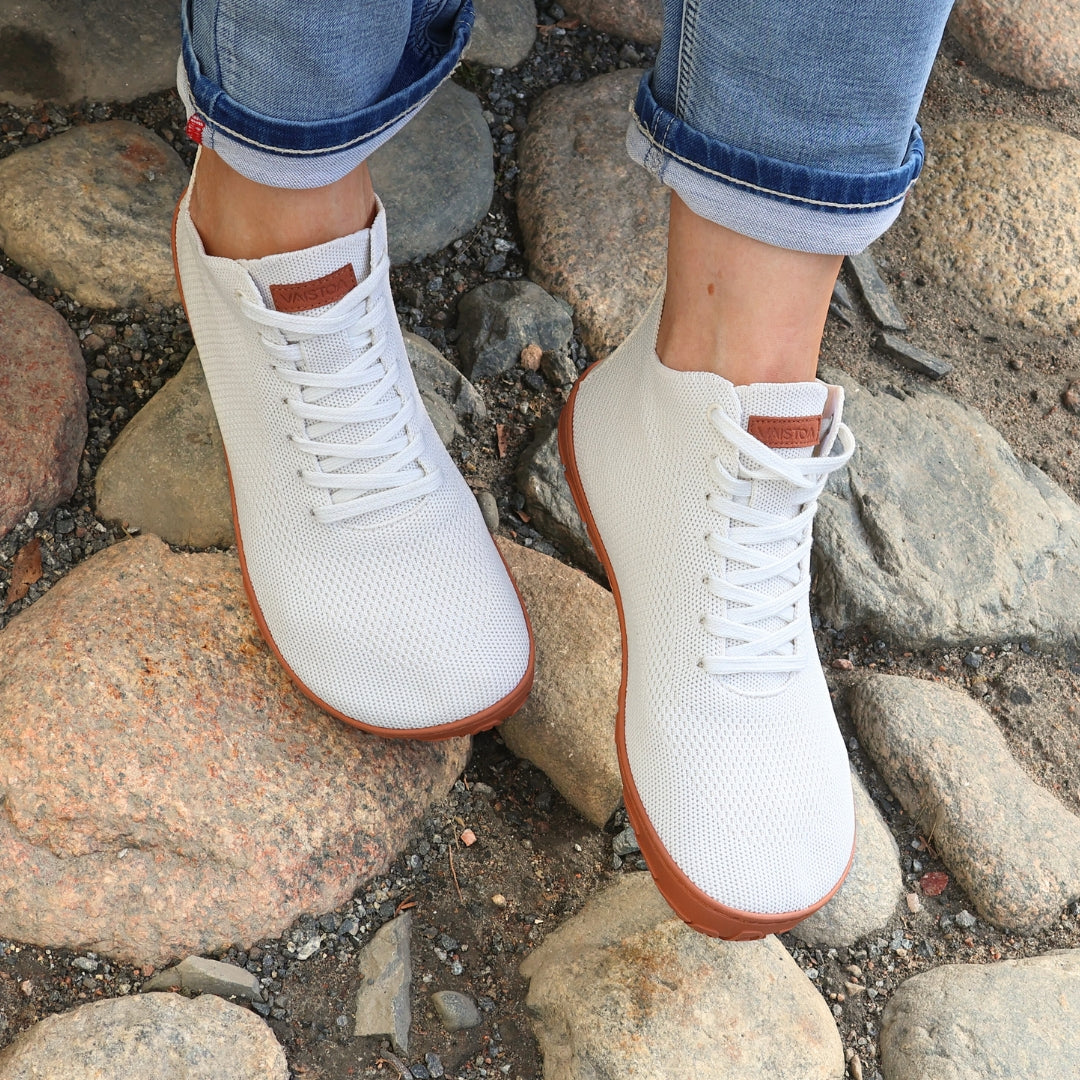 vaistoa iloa mid barefoot shoes knitted high top sneakers natural white terracotta lifestyle spring cobblestones