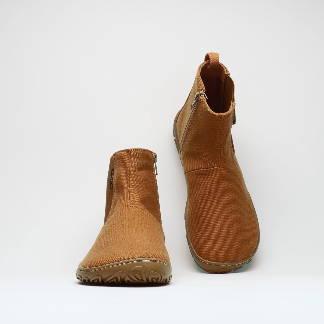 Vaistoa Kajo 2 barefoot chelsea boots – almond brown pair shown from a high angle, wide toe box and both side zippers visible against a light background