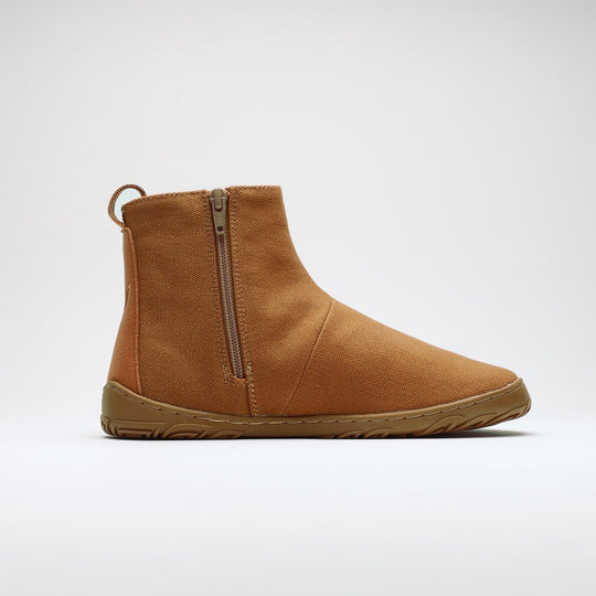 Vaistoa Kajo 2 barefoot chelsea boots – almond brown shoe shown from the side with the side zipper visible, flat zero-drop sole against a light background