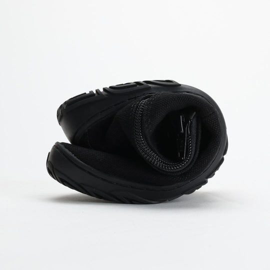 Vaistoa Kajo barefoot Chelsea boots – black, studio shot of two boots stacked, the upper one bent over to show how flexible the upper is, side zipper visible