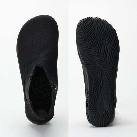 Vaistoa Kajo barefoot Chelsea boots – black, two studio views side by side, the boot from above showing the zipper and the interior, and the full outsole with its leaf tread pattern