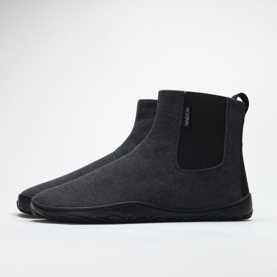 Vaistoa Kajo barefoot Chelsea boots – smoky stonewashed grey, single boot photographed from the side, elastic side panel and heel loop visible, light background