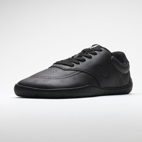 Vaistoa Katu 2 black barefoot sneaker – single shoe photographed from the front angle, showing the minimalist design, wide toe box, and thin flexible sole.