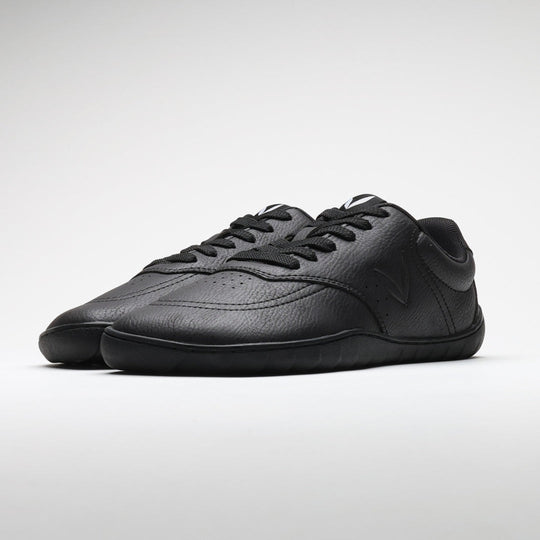 Vaistoa Katu 2 black barefoot sneakers – a pair of shoes photographed from the front angle, highlighting the minimalist design, wide toe box, and low profile.