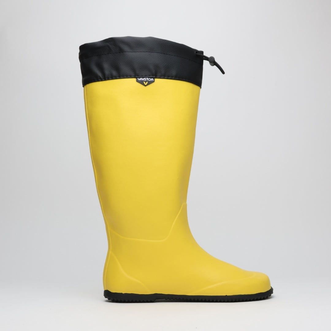 Vaistoa Katve 2 barefoot rubber boots yellow side view from the outer edge, flat zero drop sole with no heel rise