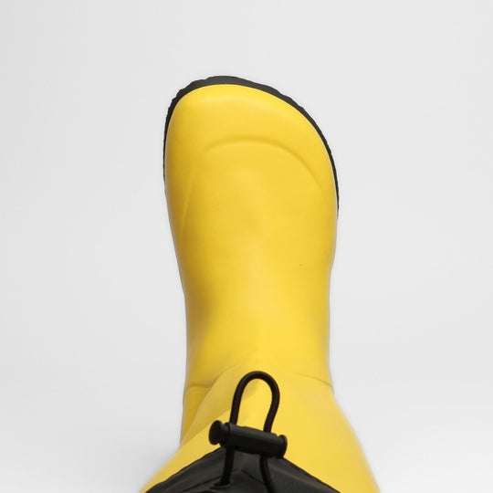 Vaistoa Katve 2 barefoot rubber boots yellow wide foot-shaped toe box seen from above