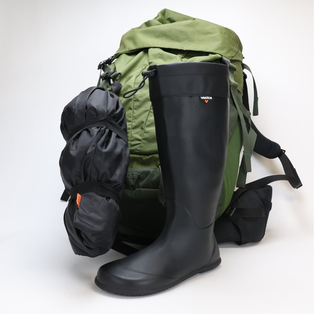 vaistoa katve barefoot shoes rubber rain boots black carrying pouch hangs on backpack