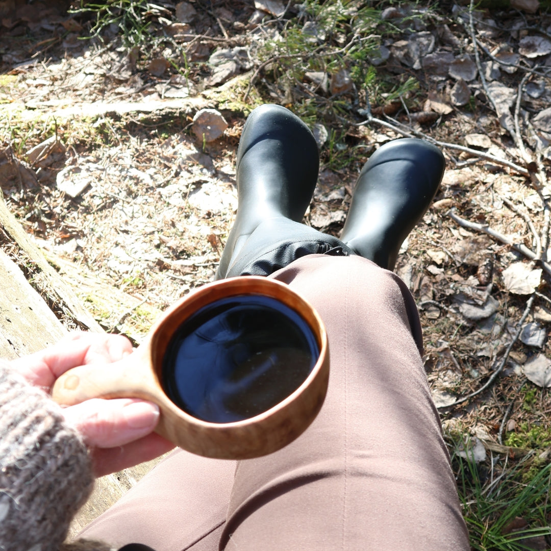 vaistoa katve barefoot shoes rubber rain boots black lifestyle spring break drinking from kuksa