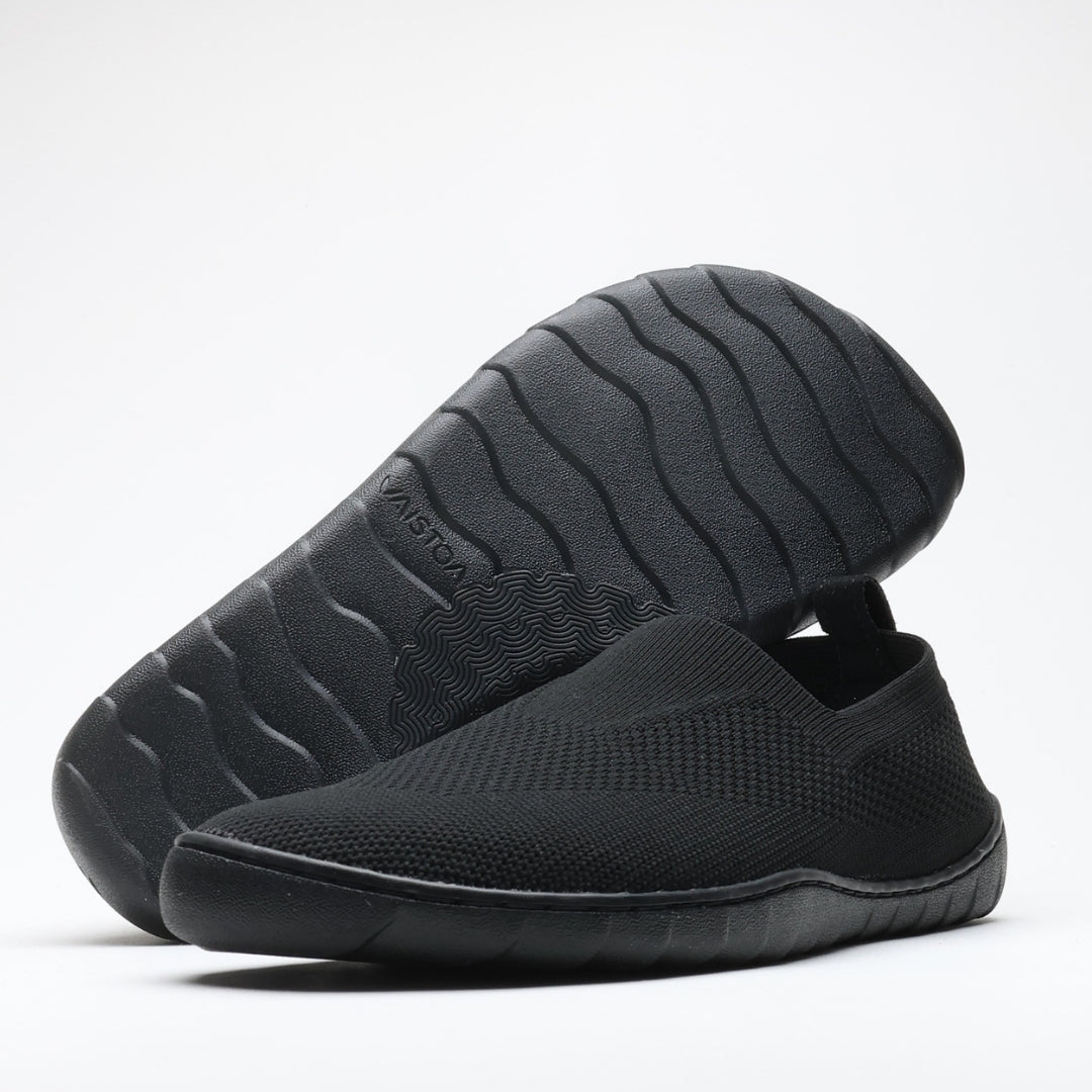 Vaistoa Lempeä 3 slip-on barefoot shoes – black shoes shown as a pair from an angled side view, with outsole visible