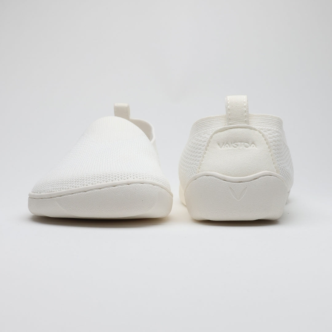 White Vaistoa Lempeä 3 slip-on barefoot shoes shown as a pair from front and back views