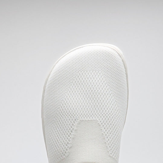 Vaistoa Lempeä 3 slip-on barefoot shoes – close-up of the white knit upper showing a wide, foot-shaped toe box