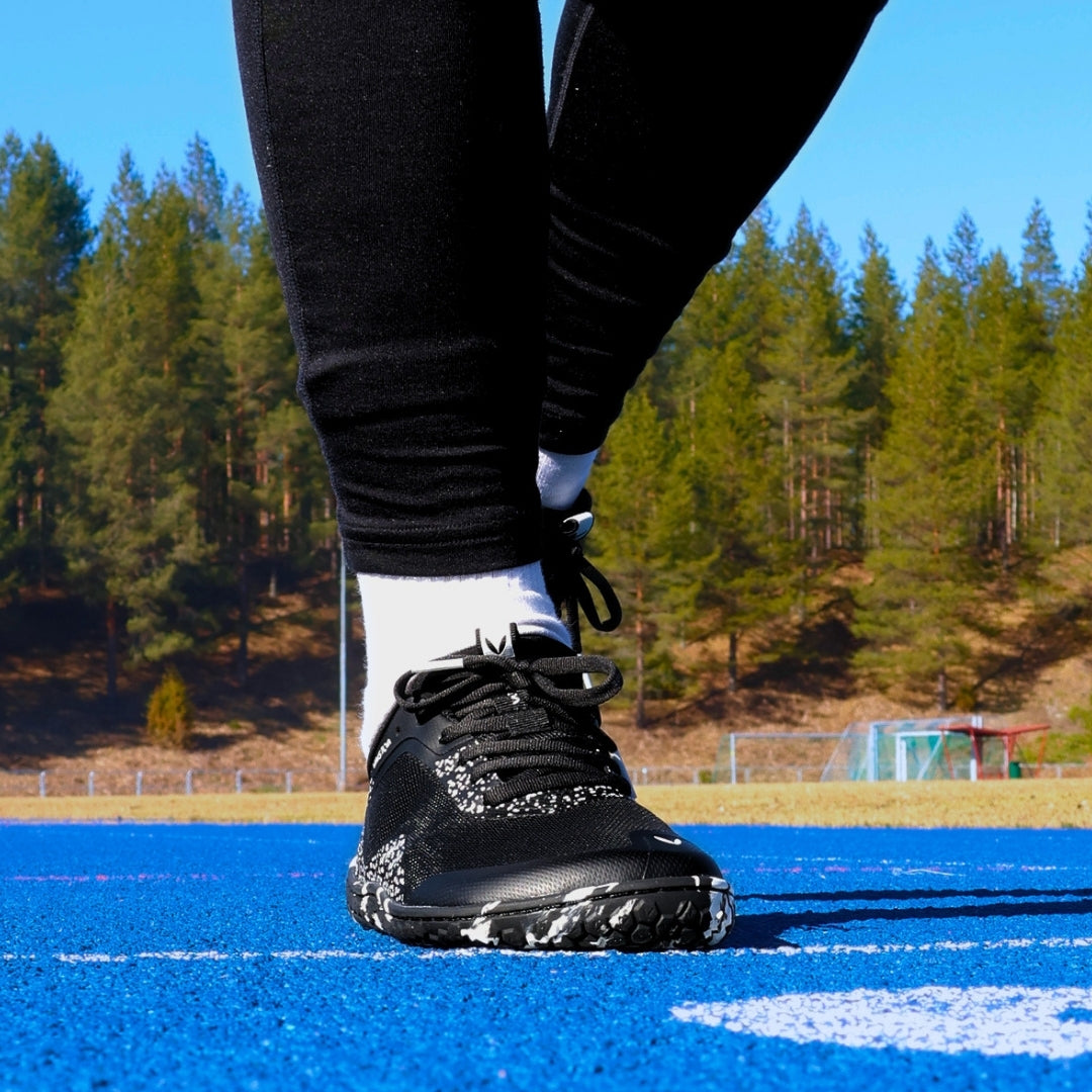 Vaistoa Lento barefoot running shoes – shoe worn on foot on a running track, shown from the front