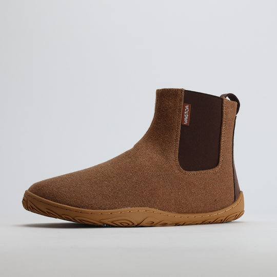 Single roasted almond barefoot winter felt Chelsea boot shown from a front angle on a light gray background.
