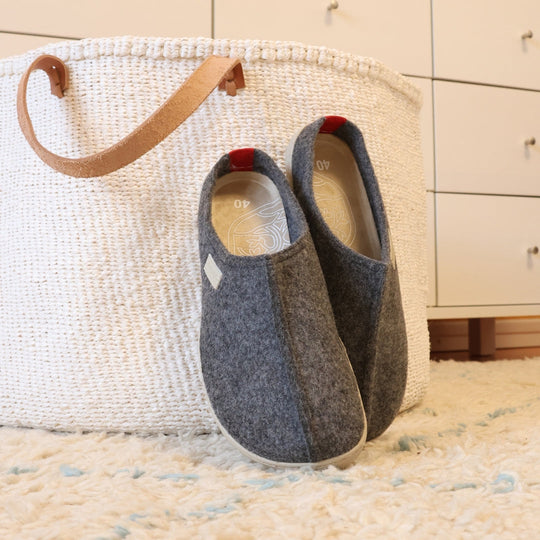 vaistoa toive barefoot felt slippers gray next to bag