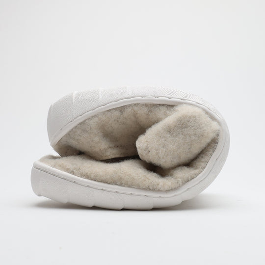 Vaistoa Toive felt barefoot slippers – vanilla grey felt slipper folded in half to show the thin and flexible outsole
