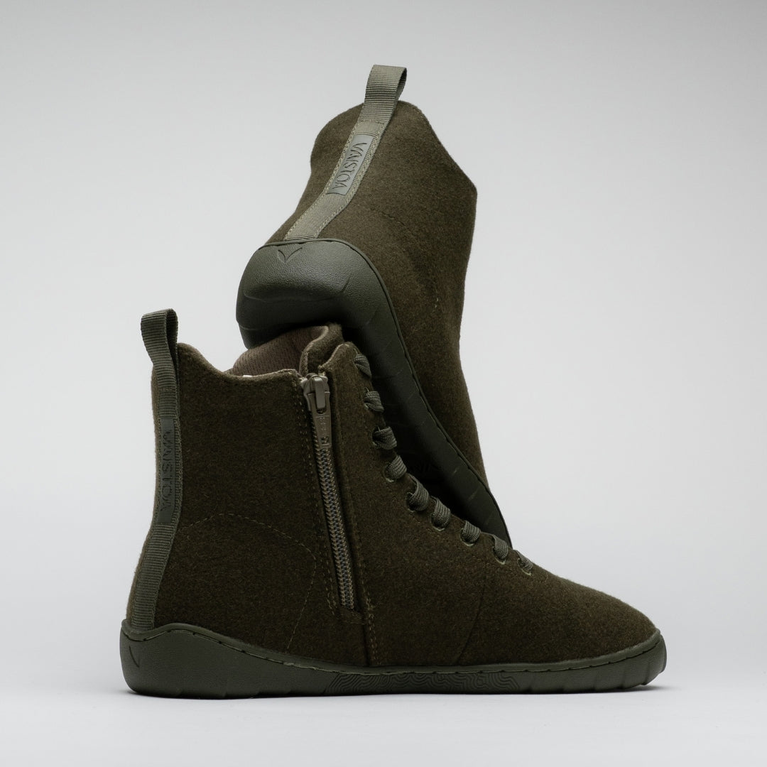 Vaistoa Tunto 2 felt barefoot sneakers – pair shown side-on, stacked one on top of the other, the vertical 'Vaistoa' text on the heel-pull tab visible, olive colour