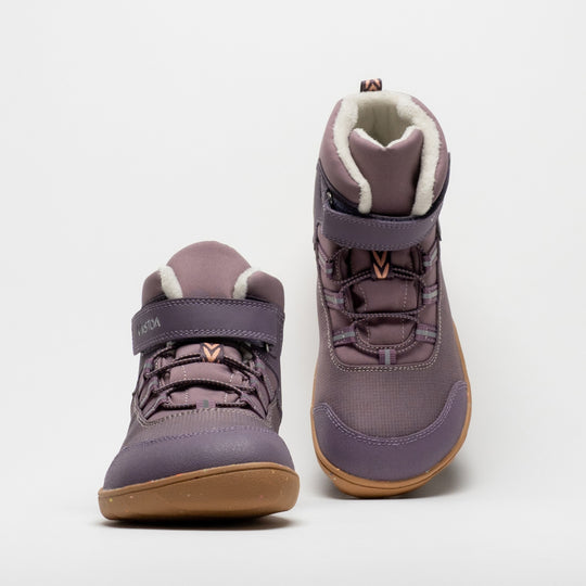 Vaistoa Ulappa 2 kids waterproof barefoot sneakers – pair with the left shoe shown from the front and the right shoe from a higher front angle, showing the quick lacing and faux fur lining at the collar