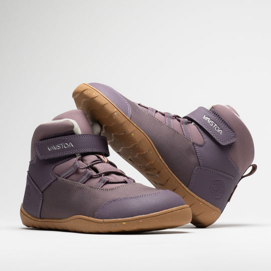 Vaistoa Ulappa 2 kids waterproof barefoot sneakers – pair with one shoe leaning horizontally against the shaft of the standing shoe, showing its outer side and the edge of the outsole