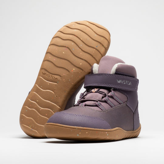Vaistoa Ulappa 2 kids waterproof barefoot sneakers – pair with one shoe standing and the other leaning upright against its shaft with the outsole facing the camera, showing the wave-patterned tread