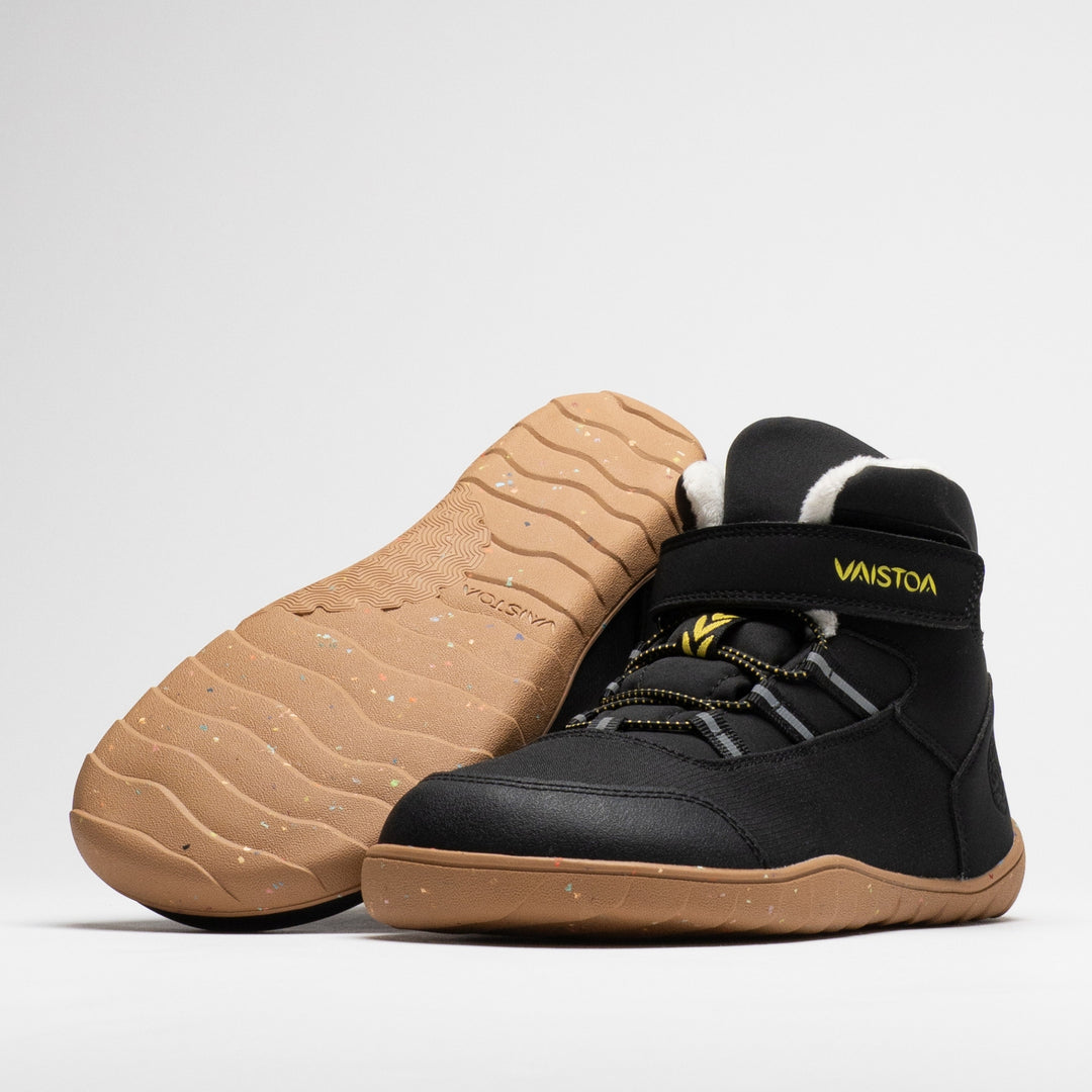 Vaistoa Ulappa 2 kids waterproof barefoot sneakers – pair with one shoe lying on its side with the outsole facing the camera and the other standing in front of it at a front angle, showing the hook-and-loop strap and quick lacing, against a light background