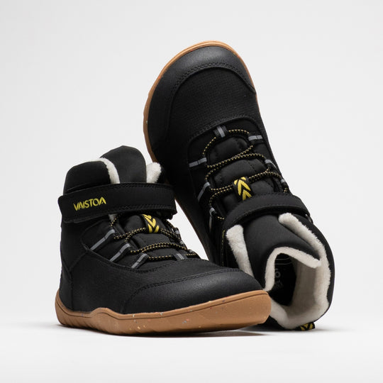 Vaistoa Ulappa 2 kids waterproof barefoot sneakers – pair with the front shoe at a front angle and the second shoe upside down behind it, showing the faux fur lining at the shaft opening