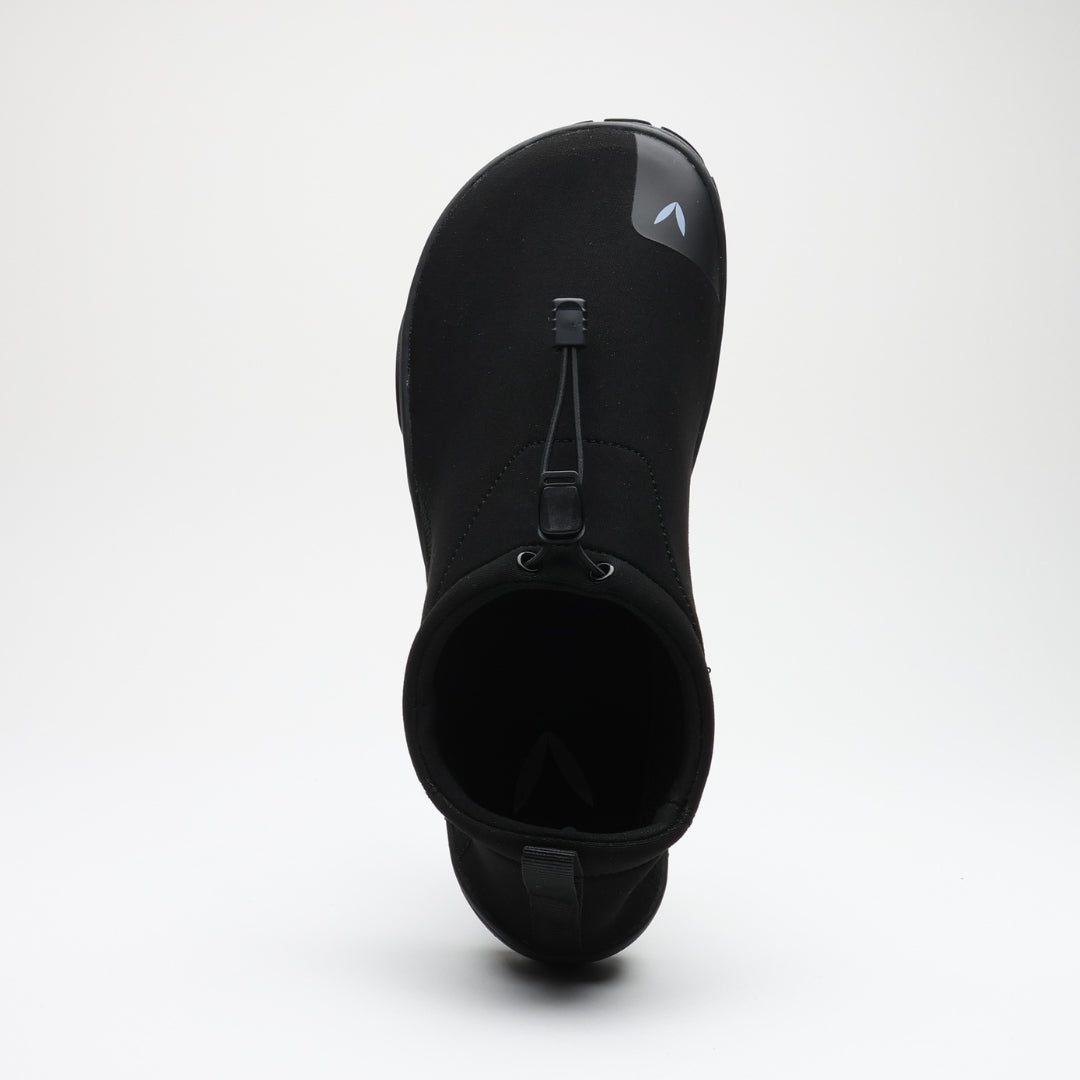 Black Vaistoa Vire barefoot shoe shown from above. The wide, foot-shaped toe box is clearly visible, along with the flexible opening and quick-lace system against a light background.